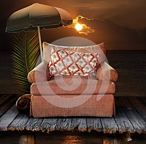 Chair on dock with sunset