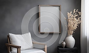 A chair is in front of a wall with a picture frame on it