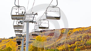 Chair lift against a beautiful autumn landscape in Utah