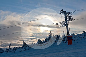Chair lift gear on winter ski resort