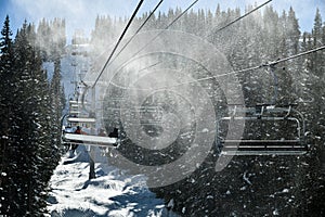 Chair lift at sunny winter day at Vail ski resort