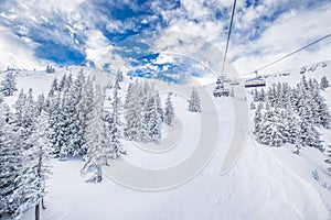 Chair lift in Tyrolian Alps in Kitzbuhel, Austria, Europe.