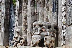 Chair and other African wood carvings at traditional Fon`s palace in Bafut, Cameroon, Africa photo