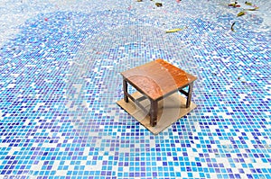 Chair on repair pool