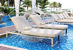 Chair side swimming pool