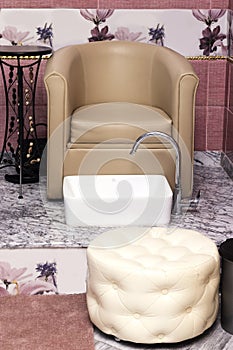 Chair and sink in a pedicure beauty salon