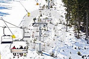 Chair ski lift elevator lifting people