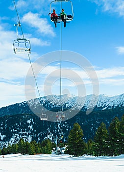 Chairlift for skiers on a rope