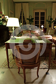 Chair and the table with a lamp