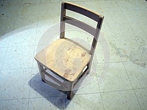 Chair under spotlight
