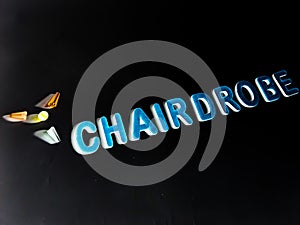 chairdrobe text written on dark illustrations background