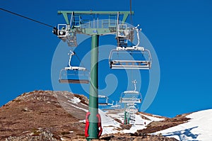 Chairlift and mountain with nice blue sky