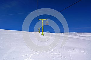 Chairlift snow and and sky