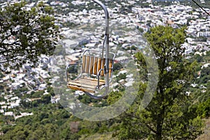 Chairlift to Monte Solaro, view of the high chair and aerial view of the town, Capri Island, Italy