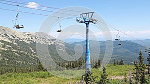Chairlift, view from high mountain, summer landscape