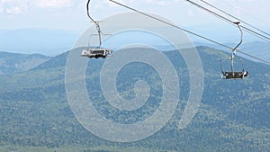 Chairlift, view from high mountain, summer landscape
