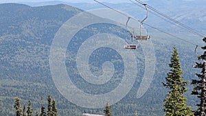 Chairlift, view from high mountain, summer landscape