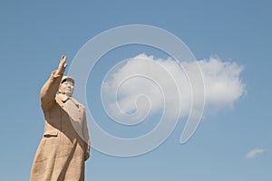 Chairman mao statue in front of blue sky