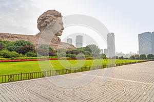 Chairman Mao statue and park lawn in Changsha, Hunan Province, China