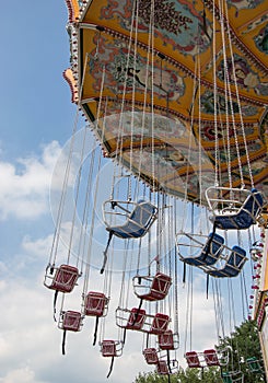 Chairoplane with clouds