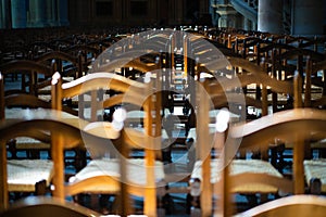 Chairs in the church expresses loneliness and anticipation.