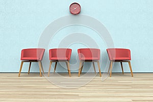 Chairs and clock in a waiting room