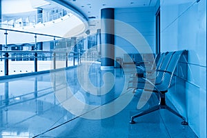 Chairs and curved corridor