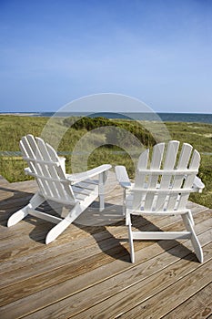 Chairs on Deck Facing Ocean