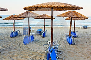 Chairs on empty beach