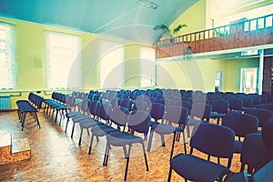 Chairs in the empty room for performances