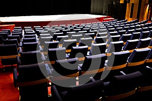 Chairs in empty theater auditorium