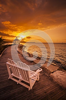 Chairs on Montego Bay at sunset