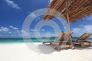 Chairs with parasol on beach