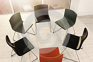 Chairs prepared for group therapy session in office