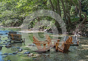 Chairs in the river