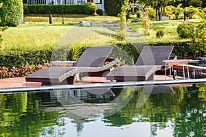 Chairs by the swimming pool.