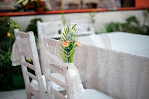 chairs and table arrangement for wedding ceremony