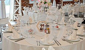 Chairs and table decorated with flowers. Special wedding concept