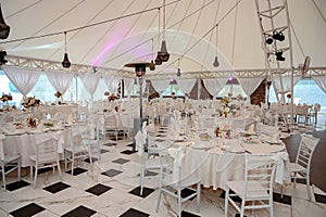 Chairs and table decorated with flowers. Special wedding concept