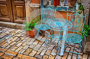 Chairs and table in the street