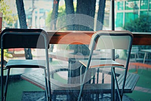 Chairs and tables in the cafe shop empty spaces Selectable focus