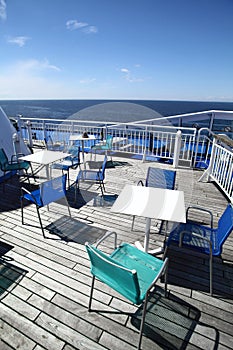 Chairs and tables on a ferry deck