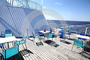 Chairs and tables on a ferry deck