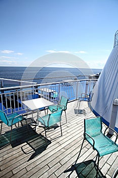 Chairs and tables on a ferry deck