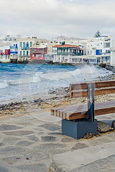 Chairs with tables in Greek tavern in Little Venice part of Mykonos town, Mykonos, Greece