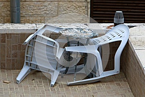 Chairs and tables in a non-working cafe, closed during the Covid-19 pandemic