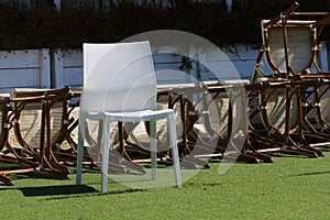 Chairs and tables in a non-working cafe, closed during the Covid-19 pandemic