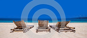 Chairs on tropical beach