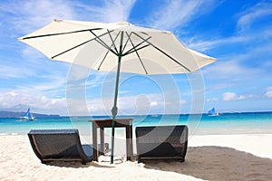 Chairs and umbrella on beach