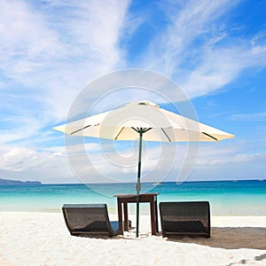 Chairs and umbrella on beach